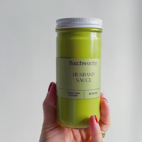 Video of a person with blonde hair enjoying our sauces.